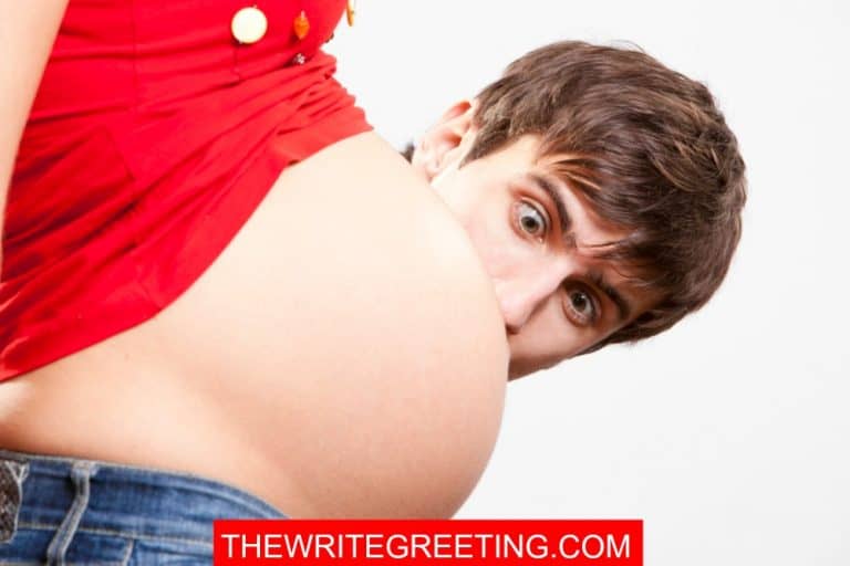 Man staring at his pregnant wife's belly
