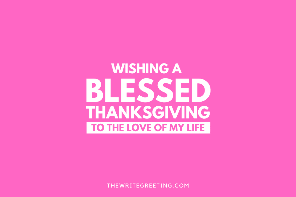 Wishing you a blessed thanksgiving in white font on pink