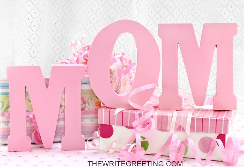 pink mom sign surrounded by pink gifts