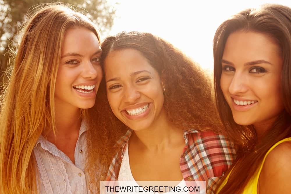 three Female best Friends laughing