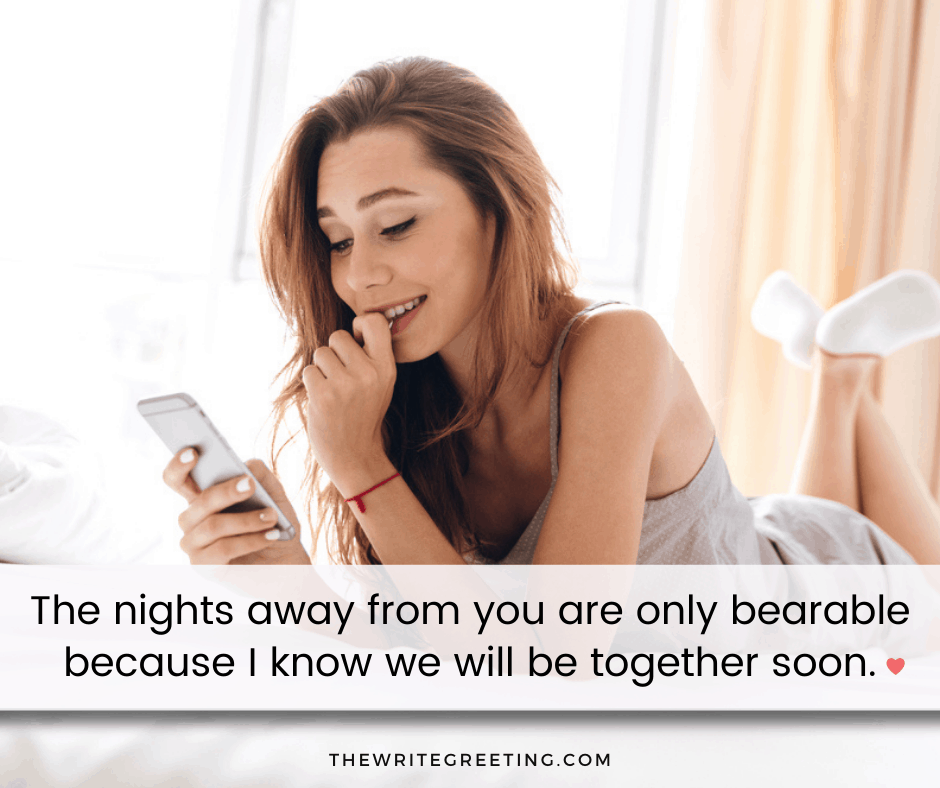 girl in bed reading text from long distance boyfriend