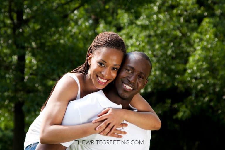 smiling young African American couple in love
