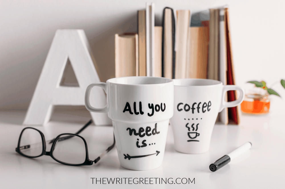 aLL YOU NEED IS COFFEE WRITTEN ON COFFEE CUP