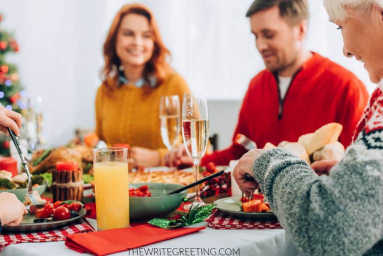 famil enjoying thanksgiving at nicely decorated table