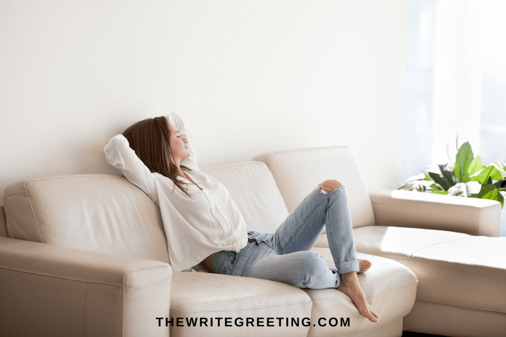 Woman relaxing on couch on the weekend