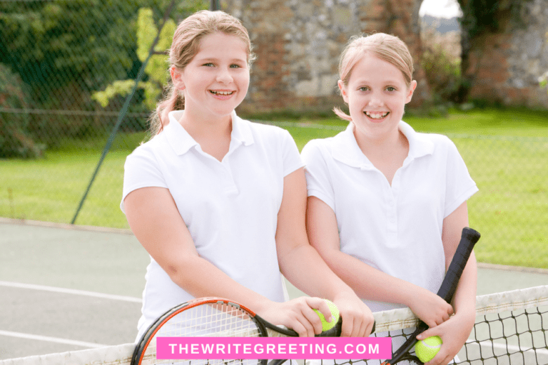 Two fifteen year old girls playing tennis