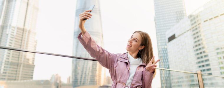 Woman taking selfie for Instagram