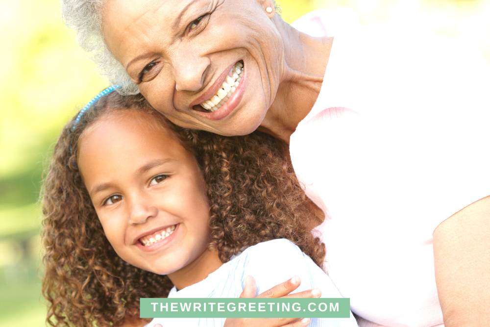 African American grandmother with curly haired granddaughter