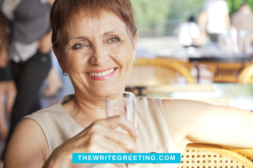 50 year old woman enjoying a drink for birthday