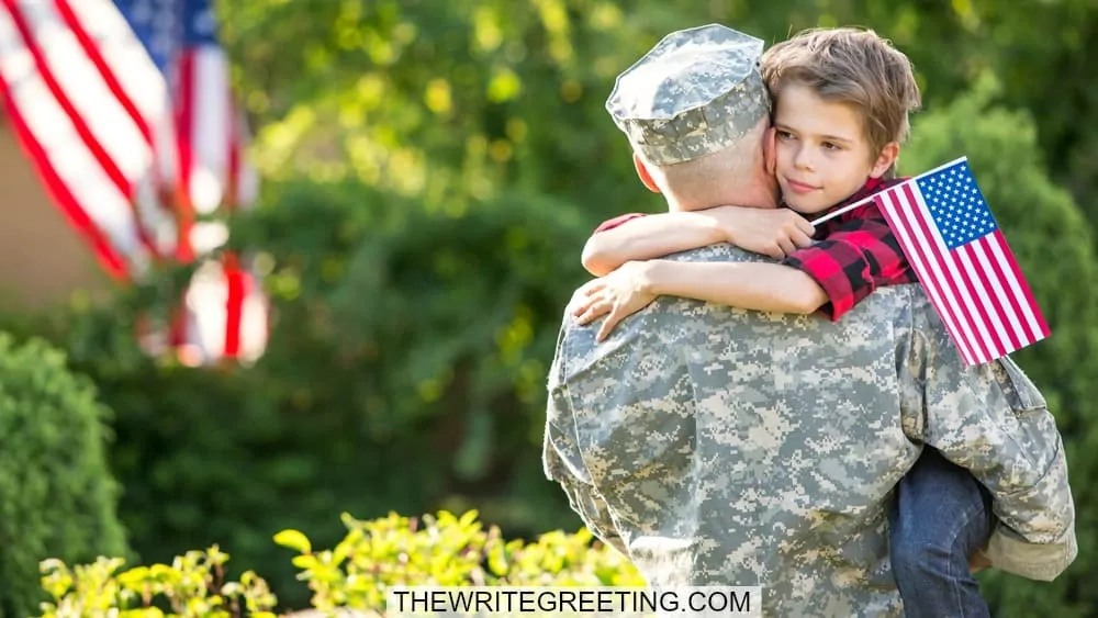 Young boy hugging military dad