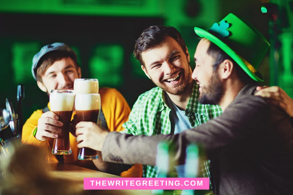 Young guys with freen Irish hats on drinking Guinness beer